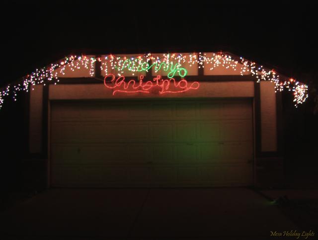 Icicle Lights and Merry Christmas over garage