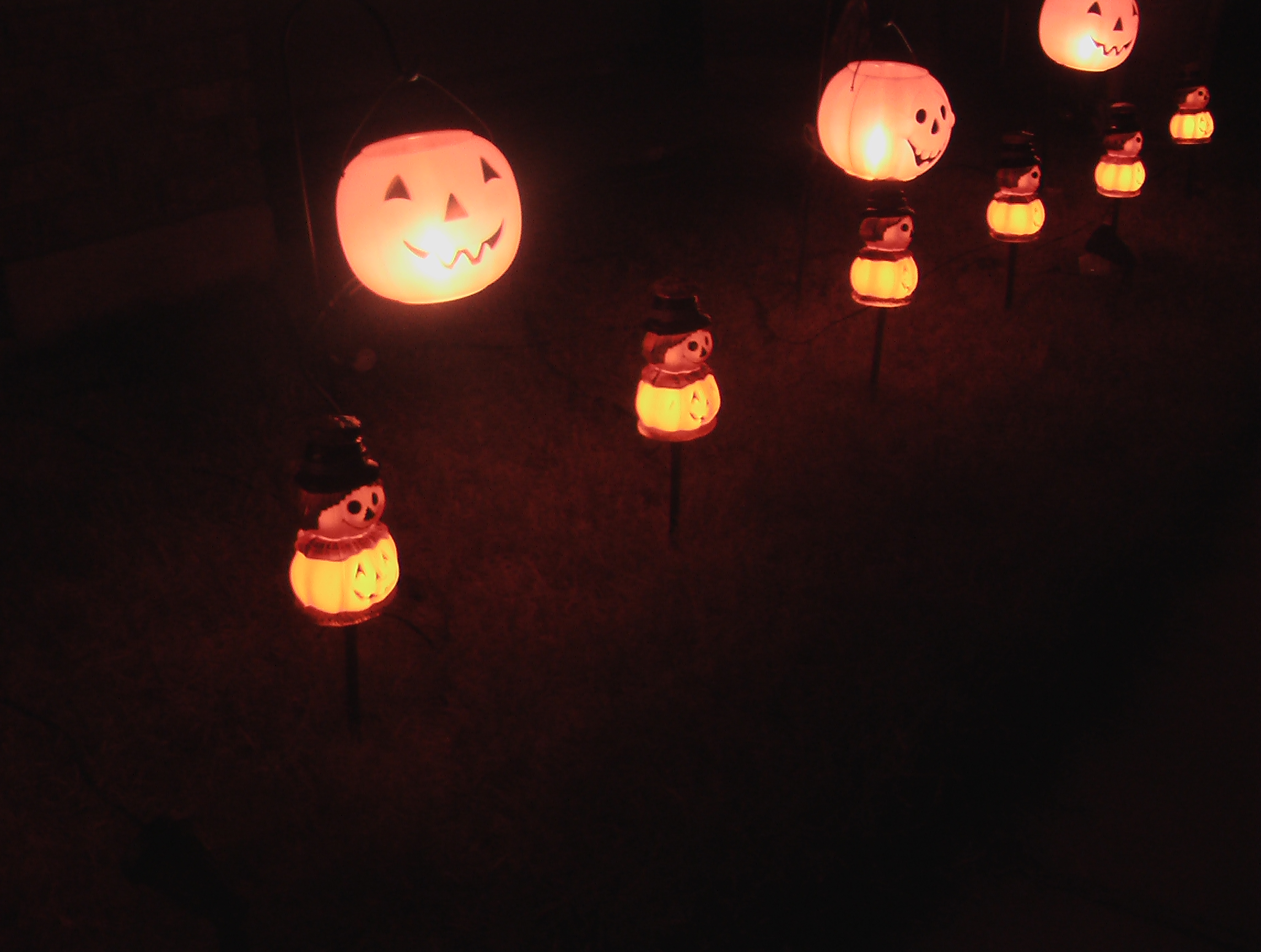 Large pumpkins and pumpkin-scarecrows